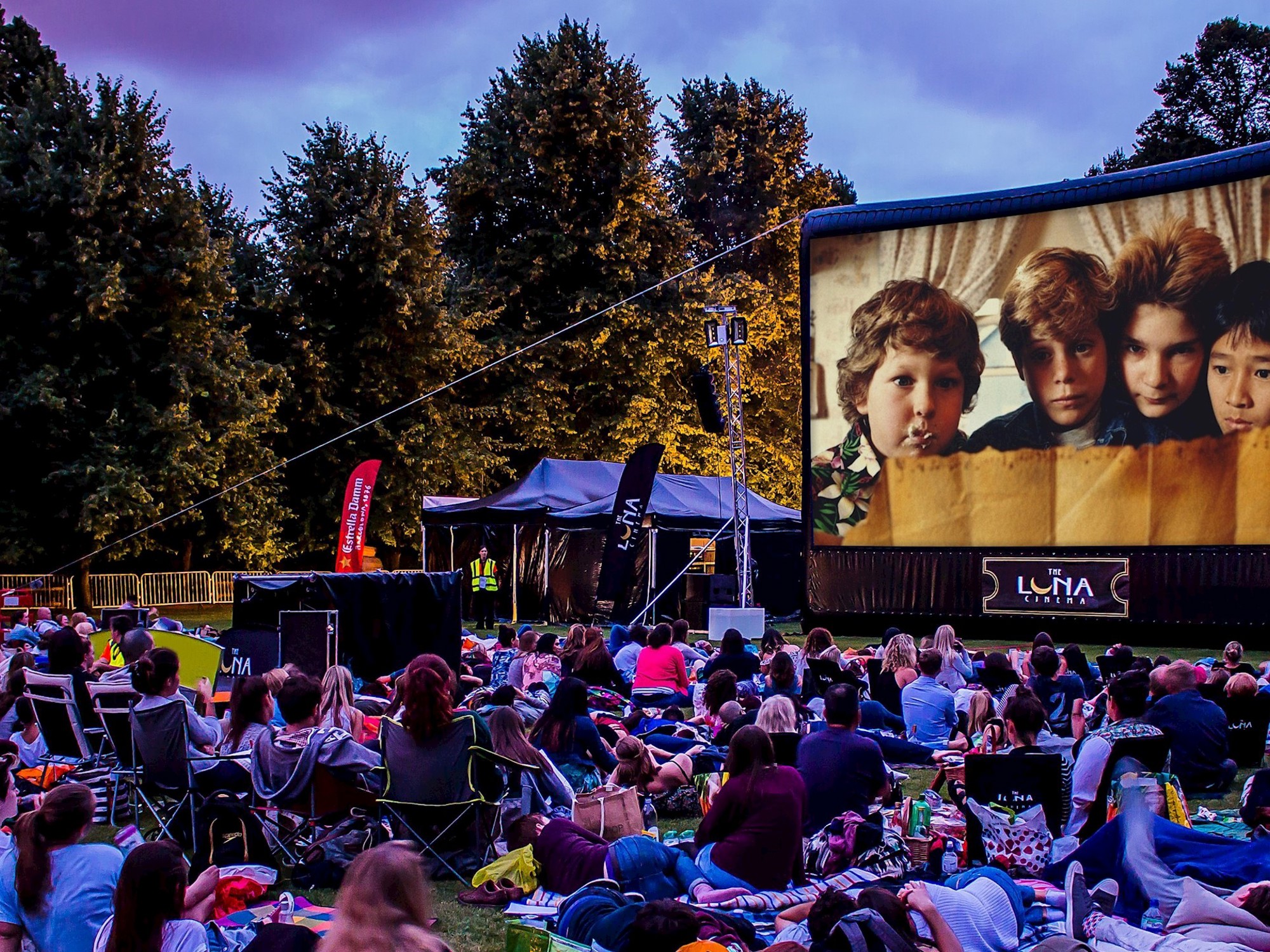 The Goonies movie played on projector in garden